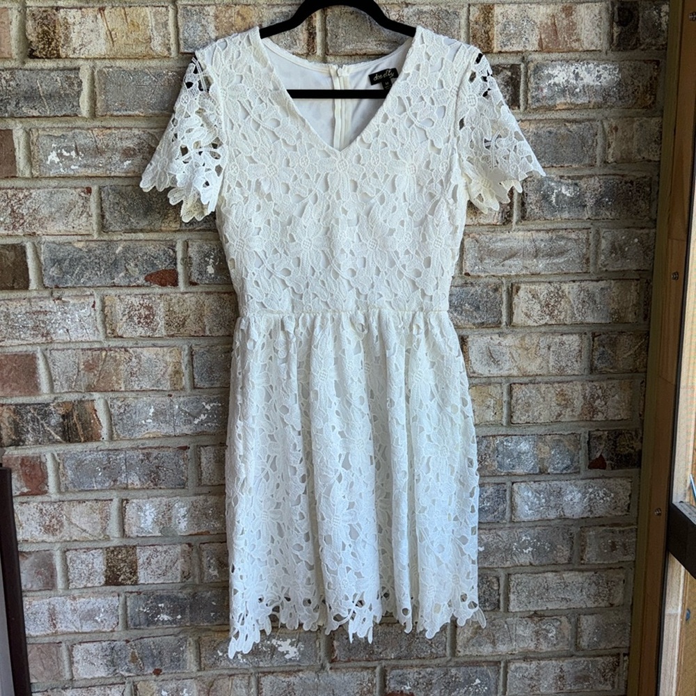 Beautiful white lace overlay dress by dee elly
